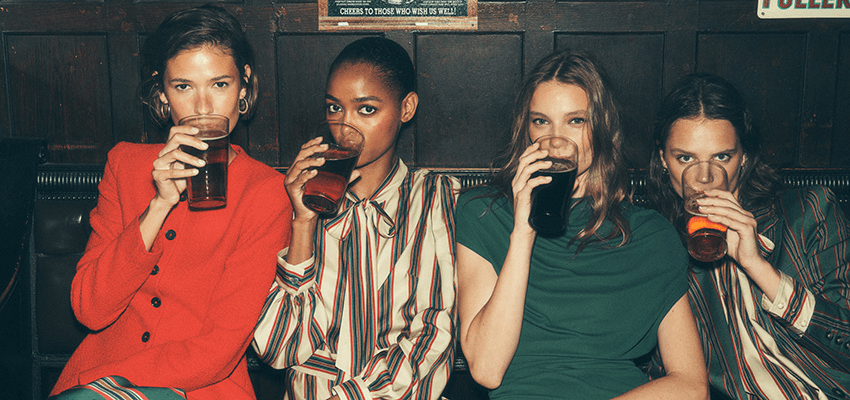 Four women drinking in a pub for Boden; Purpl discounts for disabilities and long term health conditions, mobility discounts and offers.