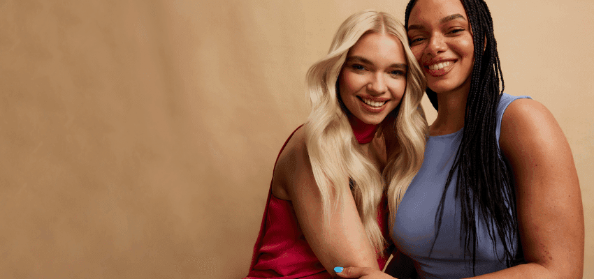 Two women smiling in LOOKFANTASTIC promo, Purpl discounts for disabilities and long term health conditions, shopping discounts for disabled people.