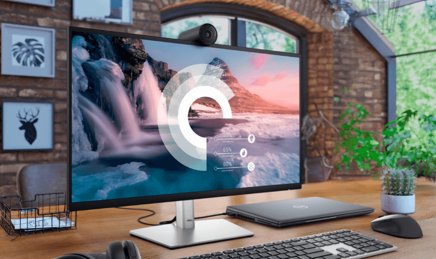 Modern Dell desktop with wide screen monitor on wooden desk, ideal for accessible home working setups with inclusive tech discounts for disabled people