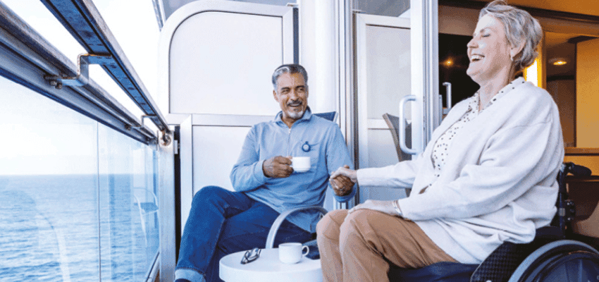 Couple relaxing on cruise balcony, Purpl discounts for disabilities and long term health conditions, disabled travel discounts UK.