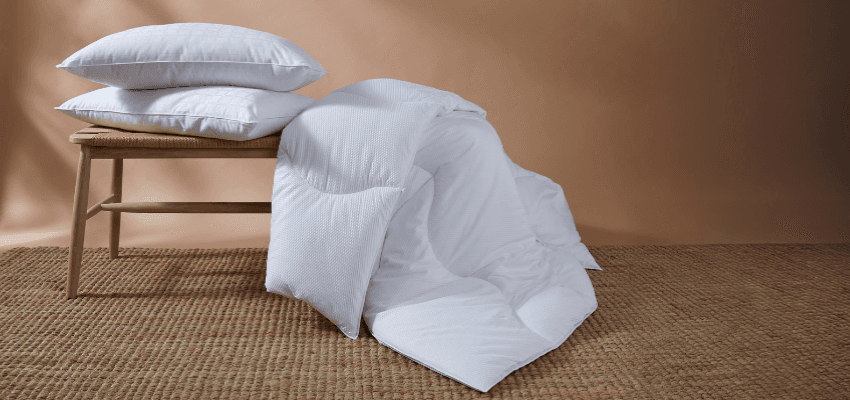 White duvet and pillows on bench, Purpl discounts for disabilities and long term health conditions, mobility discounts and offers.
