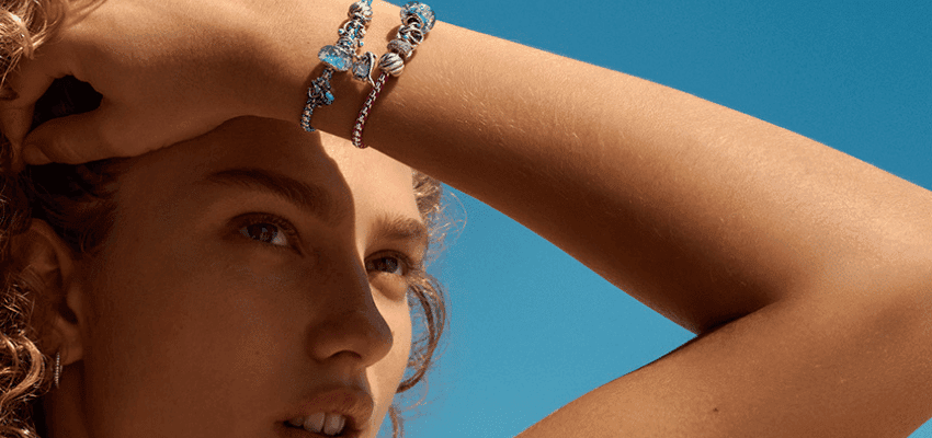 Close-up of bracelet on wrist, Pandora Purpl discounts for disabilities and long term health conditions, mobility discounts and offers.