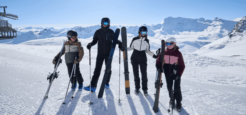 Family skiing in Dare2B ski wear, highlighting Dare2B discounts for disabled people and adaptive winter needs.