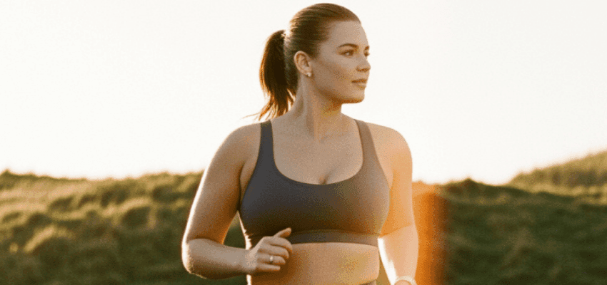 Woman jogging outdoors at sunset for Your Medicals, Purpl discounts for disabilities and long term health conditions, mobility discounts and offers.