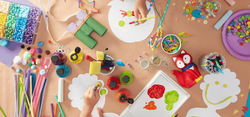 Colourful kids’ craft table scene, Purpl discounts for disabilities and long term health conditions, shopping discounts for disabled people.