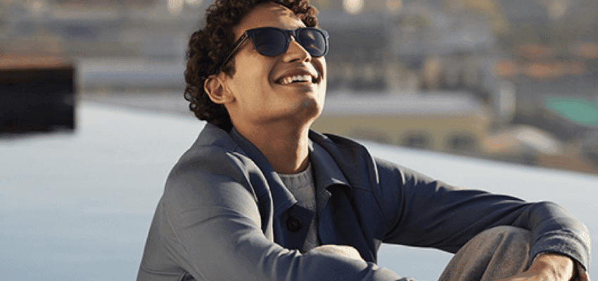 Man enjoying the sunshine wearing sunglasses from Vision Express, with exclusive disabled discounts on prescription sunglasses and eye care essentials in the UK.