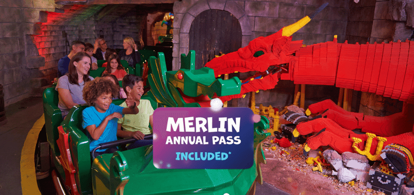 Families on LEGOLAND® Windsor ride near LEGO dragon, Purpl discounts for disabilities and long term health conditions, disabled travel discounts UK.