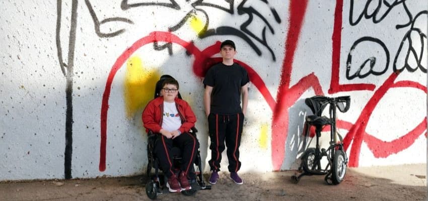 Young people with mobility aids, Adapted Trends: Purpl discounts for disabilities and long term health conditions, accessible fashion disability discount.
