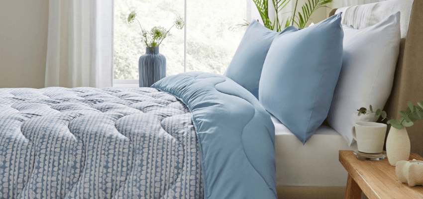 Blue bed linen and pillows on bed, Nightlark Purpl discounts for disabilities and long term health conditions, mobility discounts and offers.