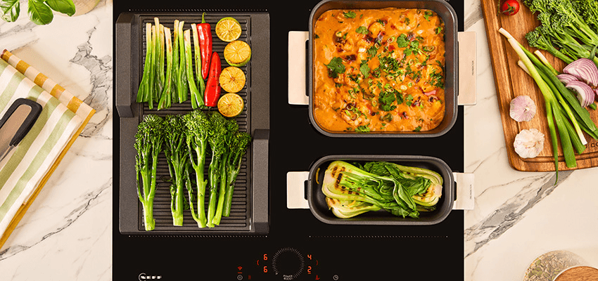 Grilled vegetables and creamy skillet dish on Neff hob, Purpl discounts for disabilities and long term health conditions, mobility discounts and offers.