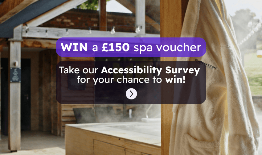 Spa robe hanging outside a wooden cabin with a purple banner that reads ‘WIN a £150 spa voucher’ and text inviting users to take an Accessibility Survey for a chance to win, promoting inclusive wellness opportunities for disabled people in the UK.