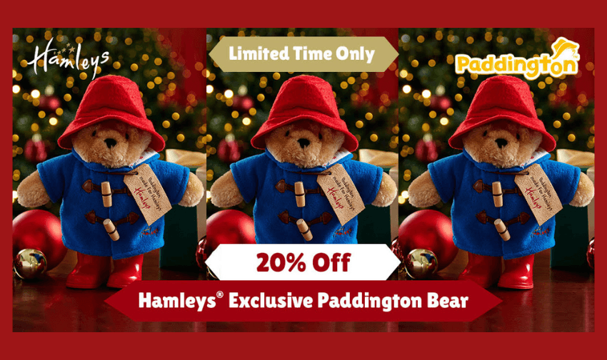 Hamleys exclusive Paddington Bear on display with festive decorations, now available at 20% off for a limited time. Perfect holiday gift for kids and collectors. Shopping discounts for disabled people, toys and gifts offers