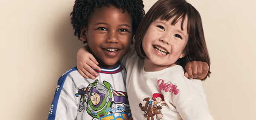 Two smiling children in character tops, Matalan Purpl discounts for disabilities and long term health conditions, shopping discounts for disabled people.