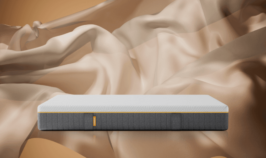 Person sleeping comfortably on a modern mattress with natural light