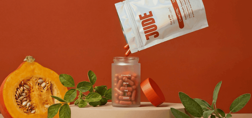 Jude supplement sachet pouring capsules beside pumpkin, Purpl discounts for disabilities and long term health conditions, mobility discounts and offers.