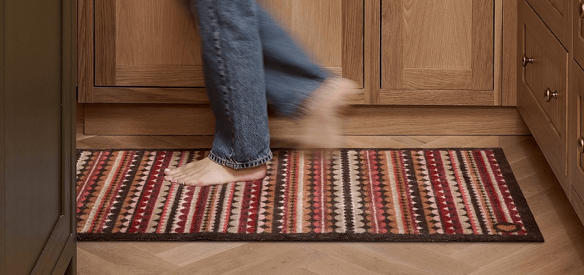 Bare feet walking on a patterned mat, Hugrug Purpl discounts for disabilities and long term health conditions, mobility discounts and offers.
