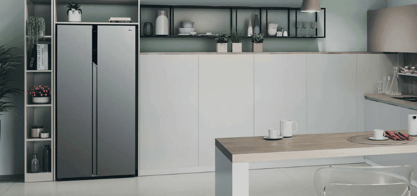 Modern Hoover fridge freezer in a sleek minimalist kitchen setting, promoting Purpl home appliance discounts for disabled people in the UK.