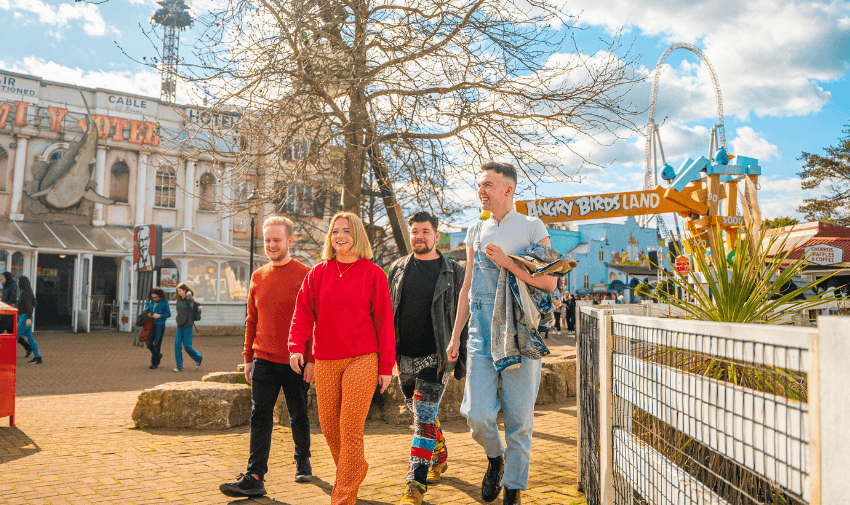Merlin theme park competition banner showing thrill rides and families with children for a chance to win four tickets perfect for accessible days out and disabled family attractions UK.