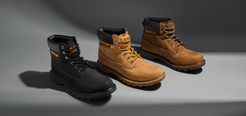 Three CAT Footwear work boots on grey backdrop, Purpl discounts for disabilities and long term health conditions, mobility discounts and offers.