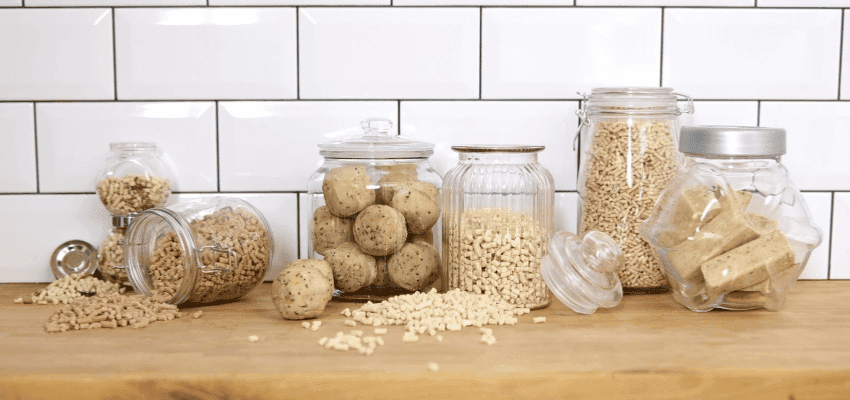 Glass jars of bird food on counter, RSPB Shop Purpl discounts for disabilities and long term health conditions, mobility discounts and offers.