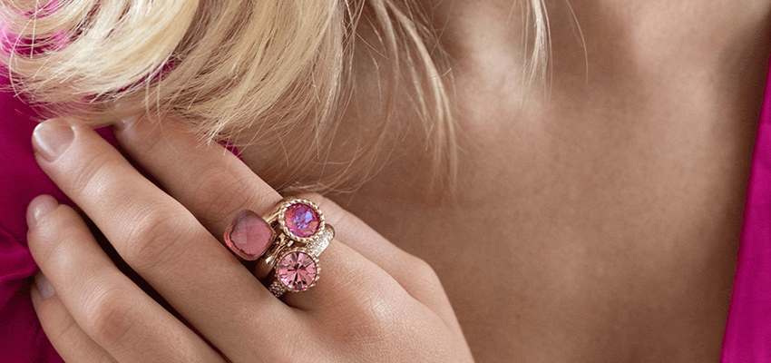 Close-up of gemstone ring on hand, Grace & Co, Purpl discounts for disabilities and long term health conditions, mobility discounts and offers.