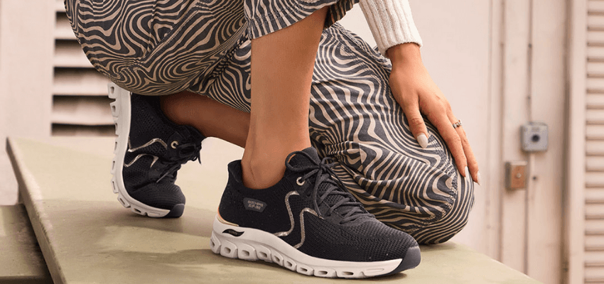 dark trainers and patterned trousers