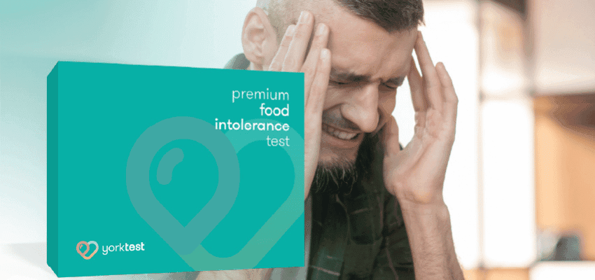 Man holding his head beside YorkTest kit, Purpl discounts for disabilities and long term health conditions, shopping discounts for disabled people.