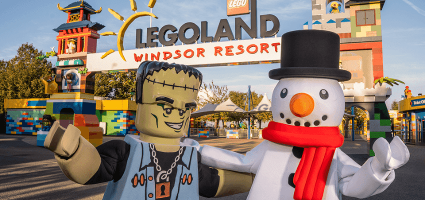 Lego Frankenstein and snowman characters outside Legoland Windsor Resort entrance, Legoland Shopping Discounts for Disabled People and Family Short Break Offers UK.