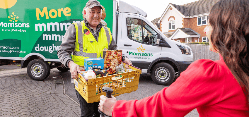 Morrisons delivery driver handing groceries to customer, Purpl discounts for disabilities and long term health conditions, shopping discounts for disabled people.