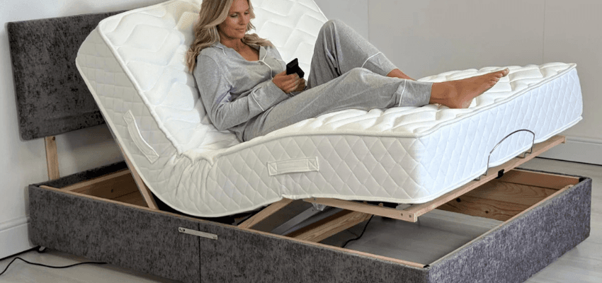 Woman relaxing on Sleepkings adjustable bed with smartphone, Purpl discounts for disabilities and long term health conditions, mobility discounts and offers.