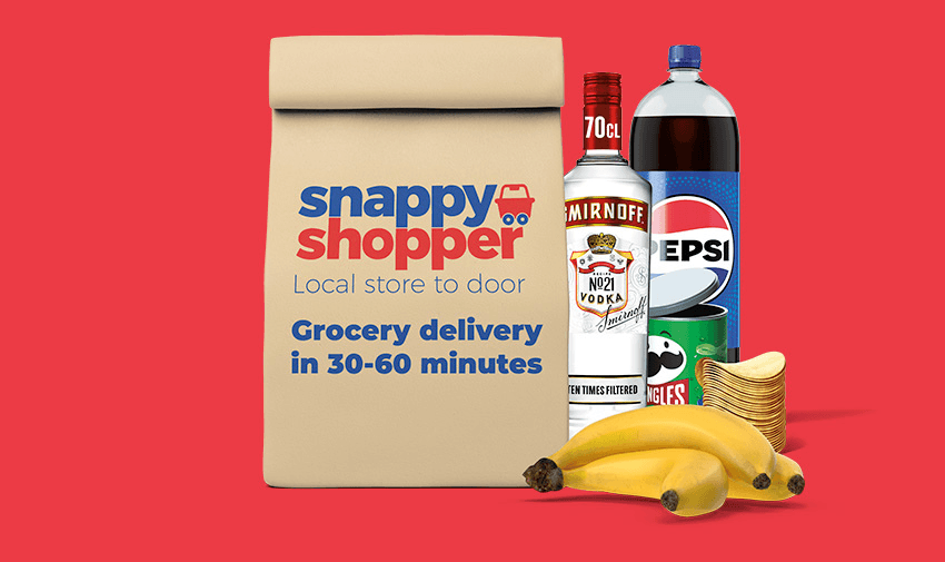 Grocery delivery bag branded with Snappy Shopper text alongside Smirnoff vodka, Pepsi bottle, Pringles, bananas and bold message saying ‘Grocery delivery in 30–60 minutes’, promoting fast local delivery with mobility discounts
