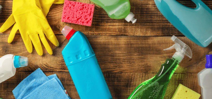 Cleaning supplies on wooden table, Staples Purpl discounts for disabilities and long term health conditions, shopping discounts for disabled people.