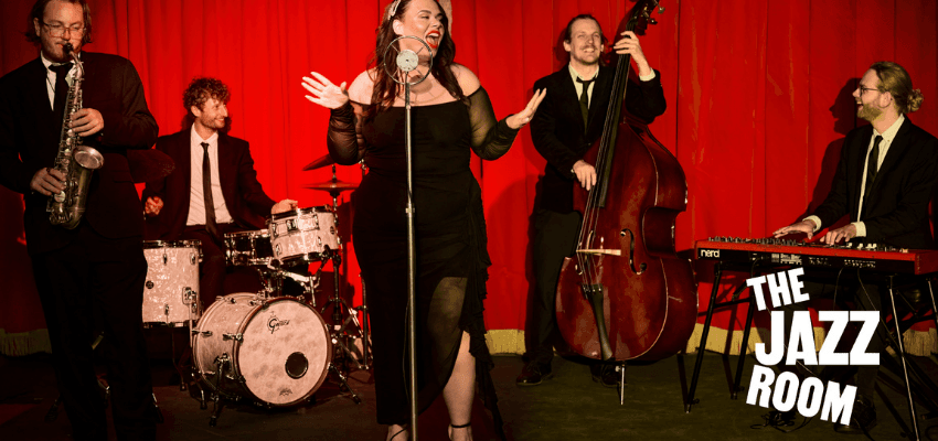 Jazz band performing on stage at The Jazz Room, Fever Purpl discounts for disabilities and long term health conditions, mobility discounts and offers.