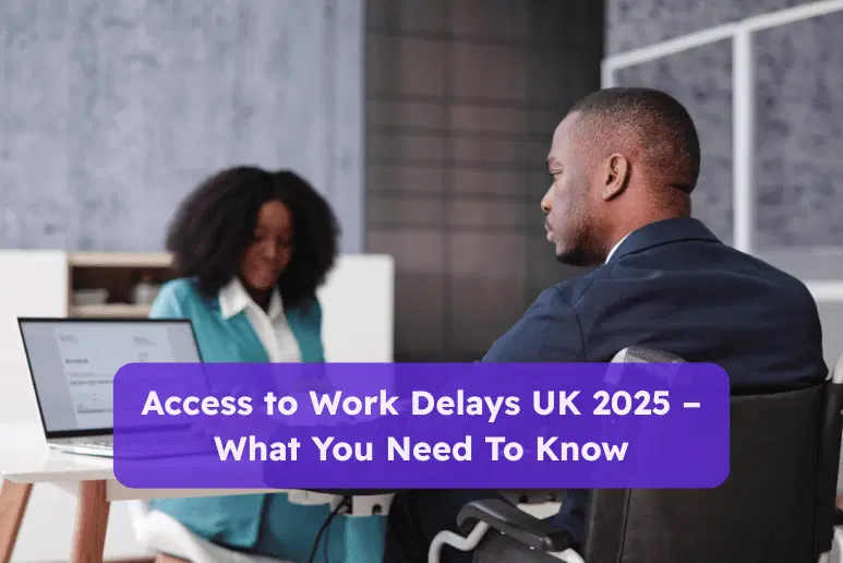 Disabled professional in a wheelchair talking with a colleague in a modern office, with text overlay reading “Access to Work Delays UK 2025 – What You Need To Know.”