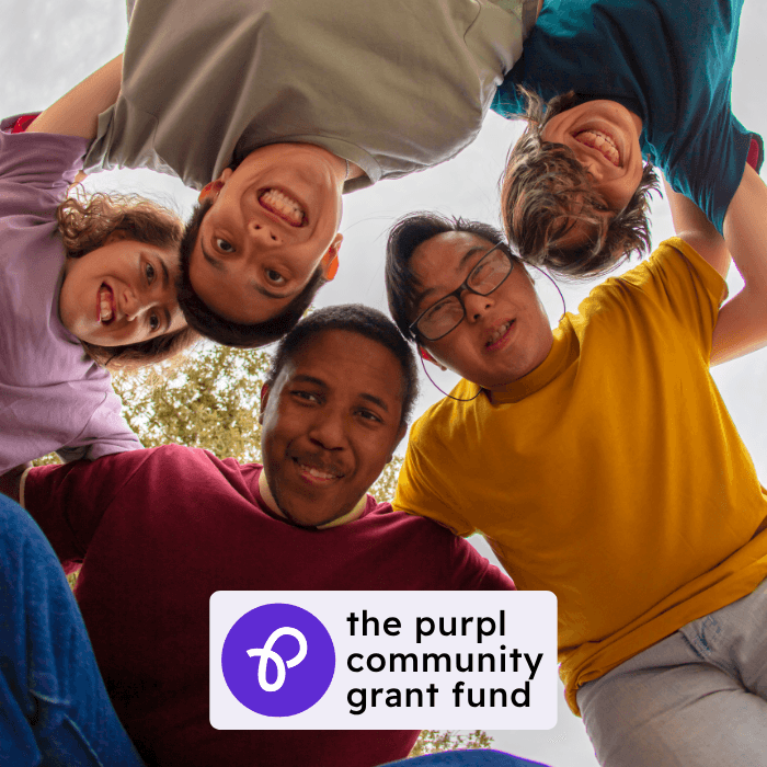Group of people representing the Purpl community grant fund supporting people with disabilities and long term health conditions through financial support and community initiatives.