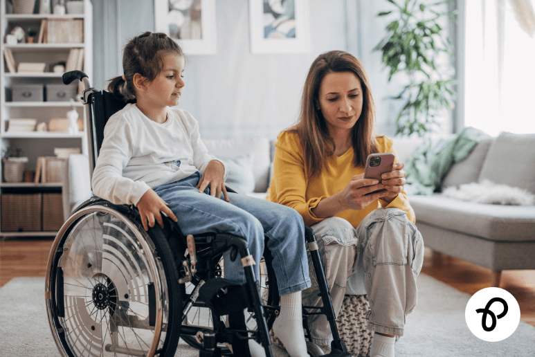A disabled child using a wheelchair at home with her parent reviewing household support, disability benefits and Purpl discounts for people with disabilities and long-term health conditions.